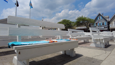 Complaints of people "reserving seats" on Rehoboth Beach Bandstand benches increase