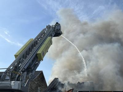 Firefighters in action fighting the flames