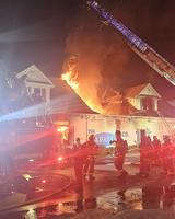 Firefighters respond to early morning fire at The Adkins Company