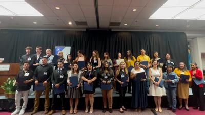 The event honored 36 new citizens and their families, celebrating their sacrifices and efforts on their journey to citizenship.