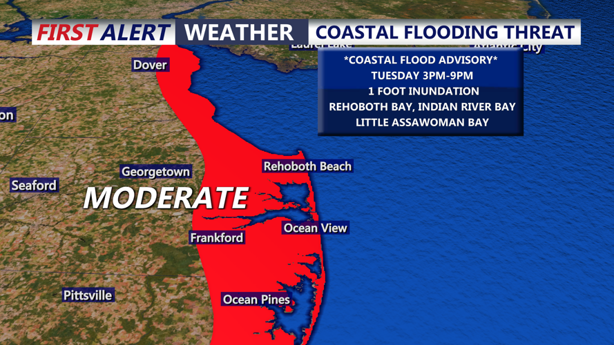 Image shows coastal flooding Tuesday.