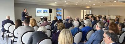 Bayhealth President and CEO Terry Murphy presents to the Rehoboth Beach Country Club