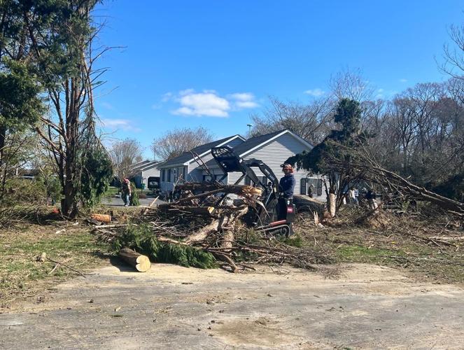 Volunteers cleaning up in Bridgeville Sunday morning.