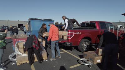 Delivering Thanksgiving meal boxes to those in need