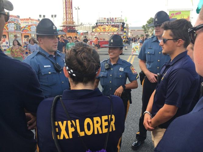 DSP troopers and explorers preparing to patrol the state fair grounds, circa 2018. Courtesy DSP.