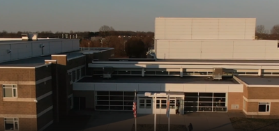 high school with flags in front 