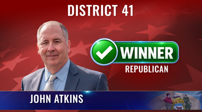 Atkin's headshot on a red background.