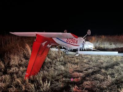 Plane flipped after emergency landing