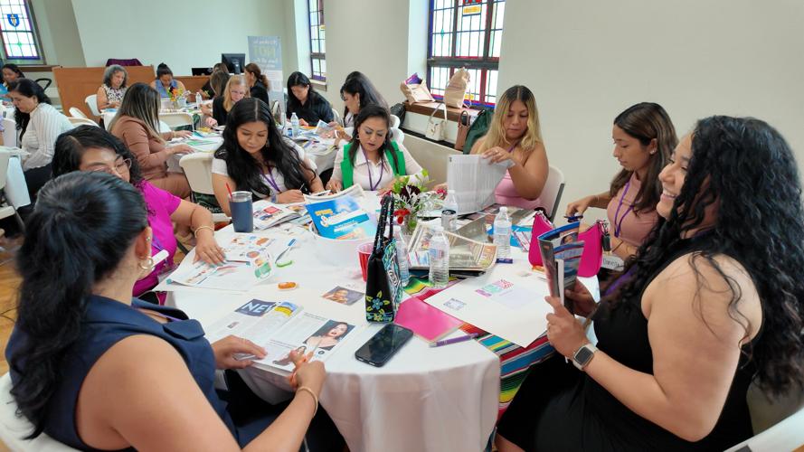 Attendees creating their vision boards.