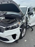 Occupant rescued from entrapment after car crash with RV trailer