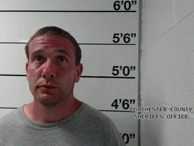 A man arrested after he was found blocking the road, kicking vehicles