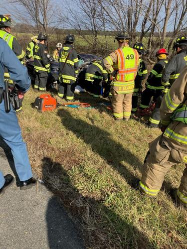 First responders around the car in the ditch. Courtesy Magnolia Volunteer Fire Company.