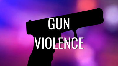 The shadow of a gun over police lights with the text "Gun Violence."