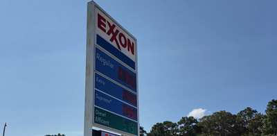 Blue and white Exxon sign. Regular: $4.15 
