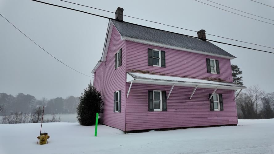 Pink house in the snow