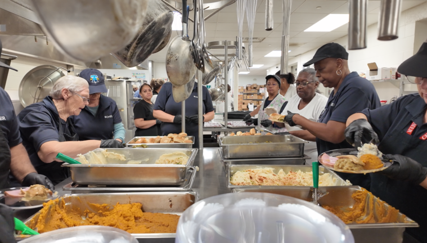 Volunteers preparing the food
