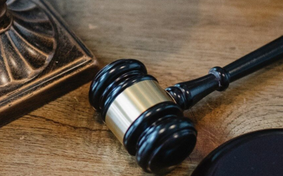 black gavel on wooden table