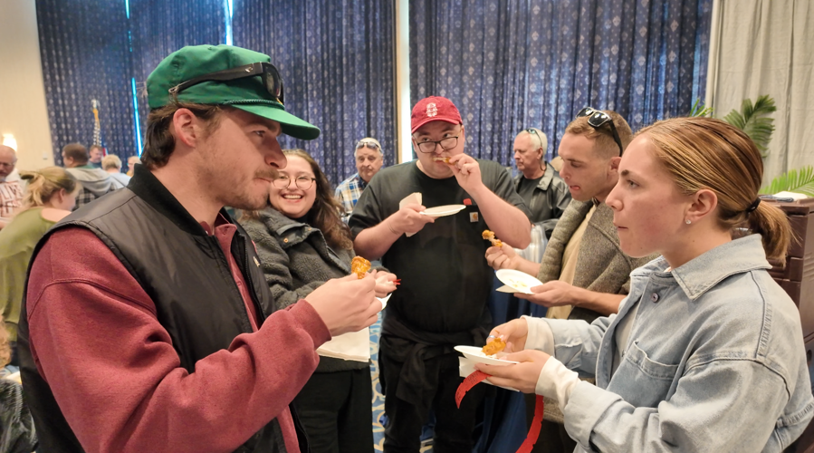 People enjoying wings
