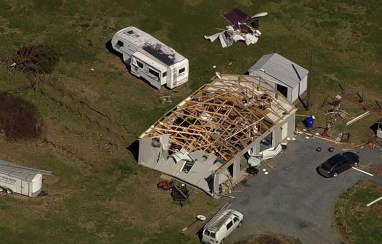 Some helicopter shots over Greenwood and Bridgeville earlier today show a clear path from the tornado demolishing some buildings without touching others nearby.
