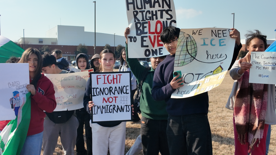 Students hold signs during a peaceful walkout at Sussex Central High School in Georgetown on Wednesday.