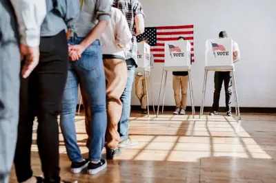 People standing in line to vote