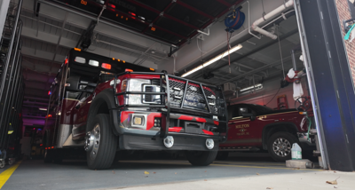 Two ambulances in the garage of Milton Fire Department. 