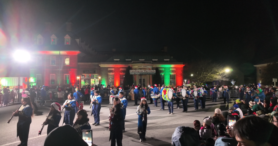 The annual parade rolled through downtown while families gathered around to watch.