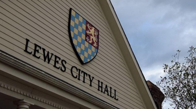 Tan building with Lewes city hall sign