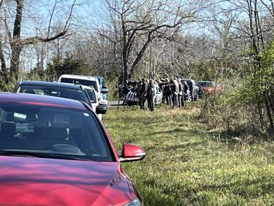 Visitors Crowd a Fox Den at Bombay Hook