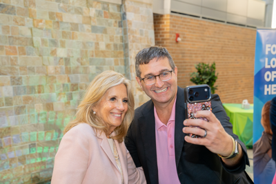 A picture of Governor Matt Meyer taking a selfie with Dr. Jill Biden