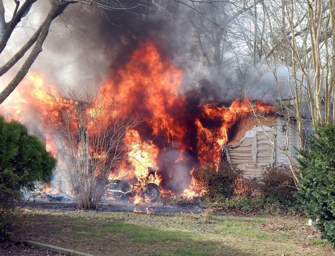 The home on Buttercup Street in flames Sunday morning. Courtesy Rehoboth Beach Volunteer Fire Company.