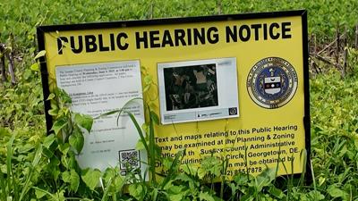 Public hearing notice for a development in Milton