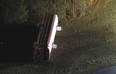 A photo of the bus turned on its side after students were removed following the accident. Courtesy NBC10.