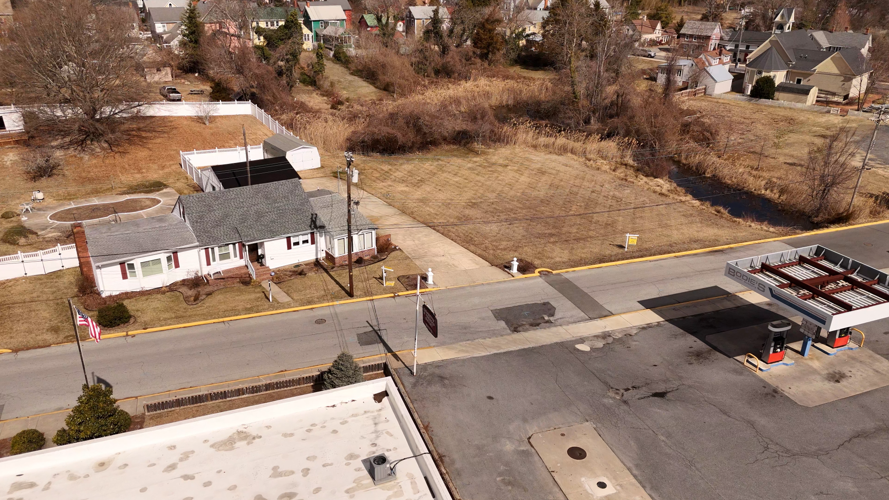 111 Magnolia St., 113 Magnolia St., and 115 Magnolia St.