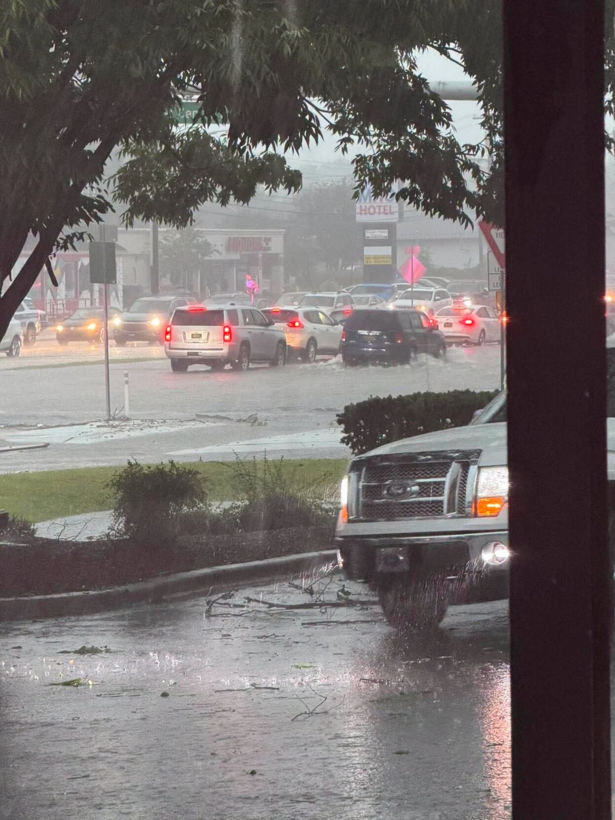 A part of a highway is flooded from rain.