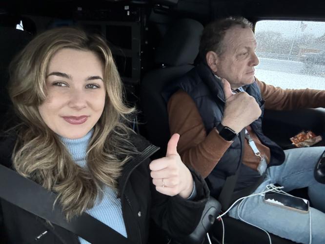 Kristina DeRobertis and Ted in the First Alert Weather Jeep