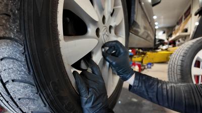 Fixing a tire at Meineke in Lewes