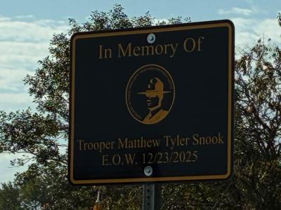 An image of the sign dedicated to Cpl. Snook. 