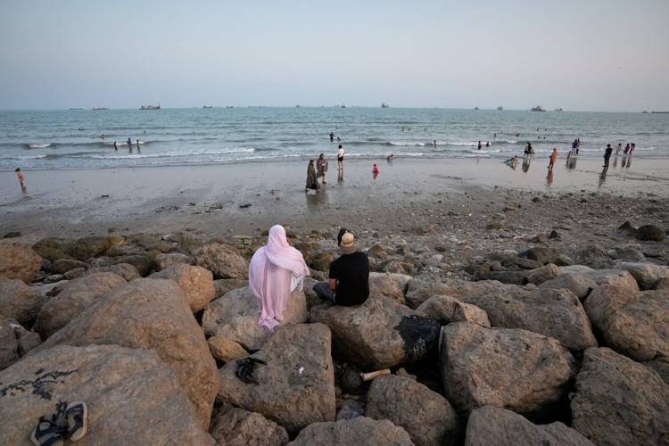 Photos show daily life in Iran on the beach along the Strait of Hormuz