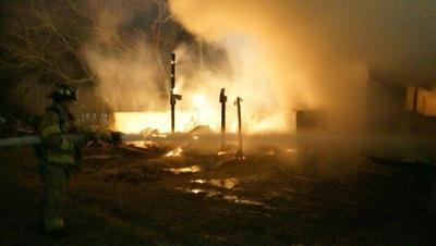 Fire destroys out building