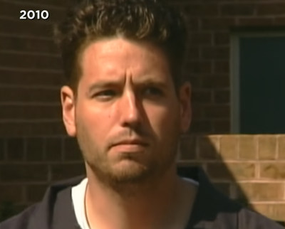 A close-up shot of a man's face with "2010" in the top left corner.