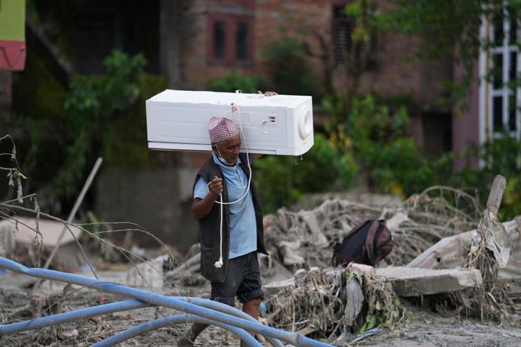 Nepal Floods Salvaging Items Photo Gallery