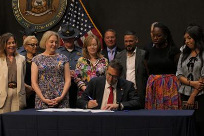 Delaware Gov. Matt Meyer signs House Bill 182. (Governor’s office)