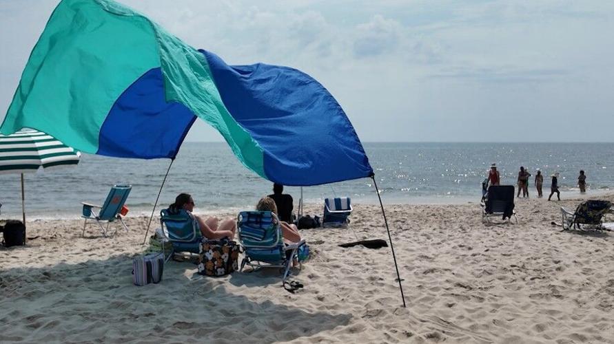 People under a canopy in Dewey