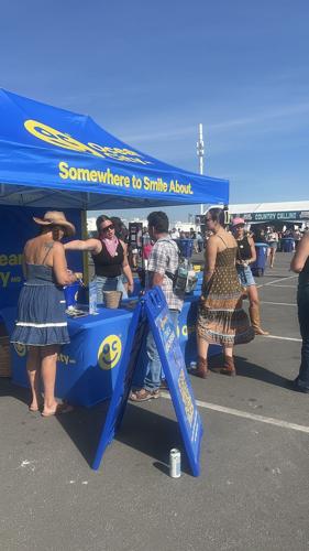 People line up to play games with Ocean City Tourism.