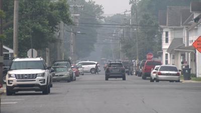 Residents who plan to spend time outdoors are advised to limit their exposure or wear masks for protection.