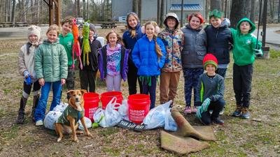 On a cold, windy day in early March, members of the Nature Adventurers 4-H Club cleaned up debris to help the environment. Courtesy Ocean Pines Association.