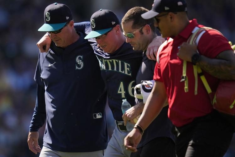APTOPIX Mariners Cubs Baseball Heat Wave Weather