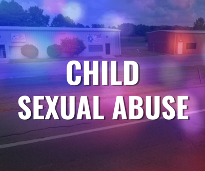 The words "Child Sexual Abuse" over a photo of the outside of the dance studio.