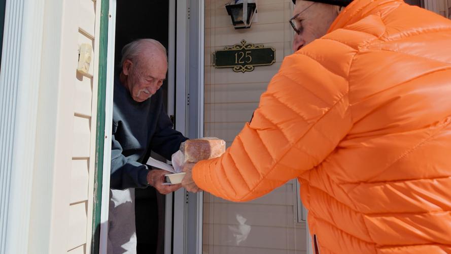 Gil handing out food
